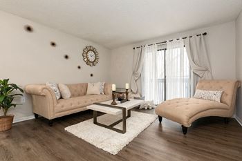 Living Room with Hardwood Style Flooring and Sliding Patio Door with Built-In Blinds